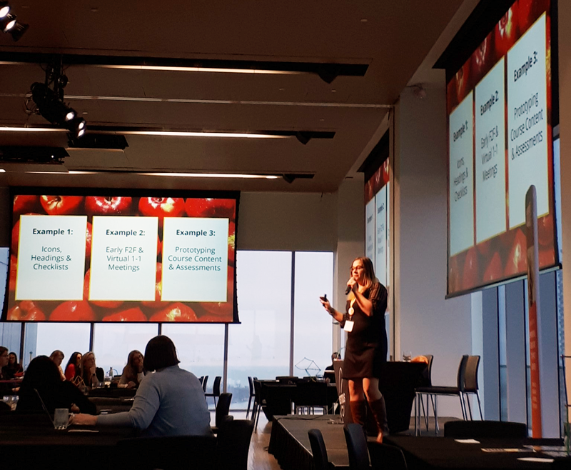 Jess on stage presenting